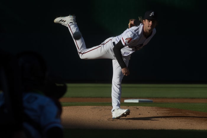 Ryne Nelson throws a pitch for the Reno Aces.
